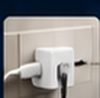 Phone charger connected to power